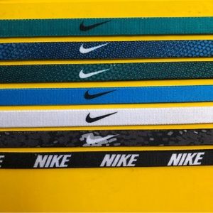 Nike headbands - never used. Set of seven.